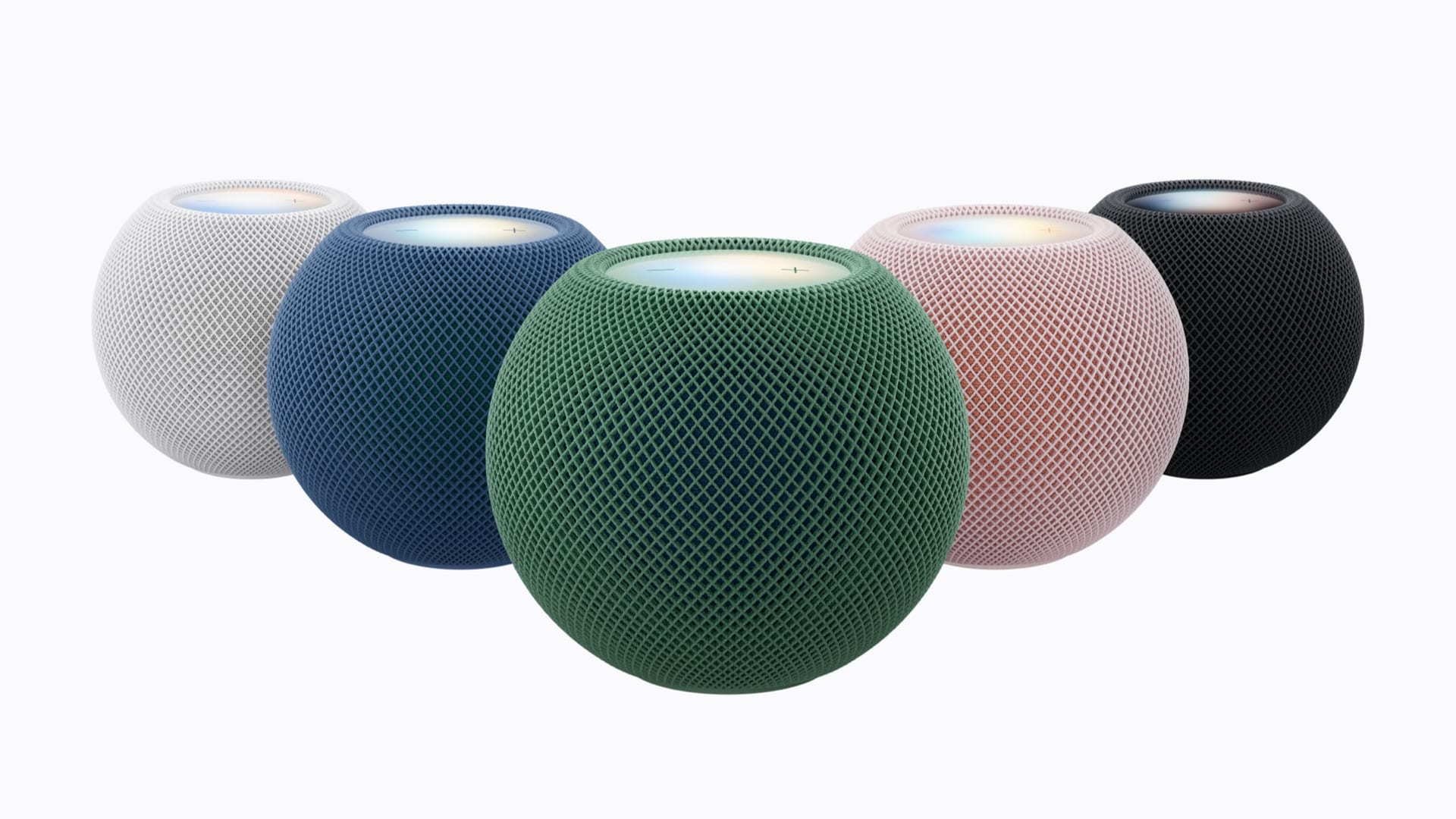 Cinco bocinas HomePod mini 2 alineadas en blanco, azul, verde, rosa y medianoche, con una luz en la parte superior.