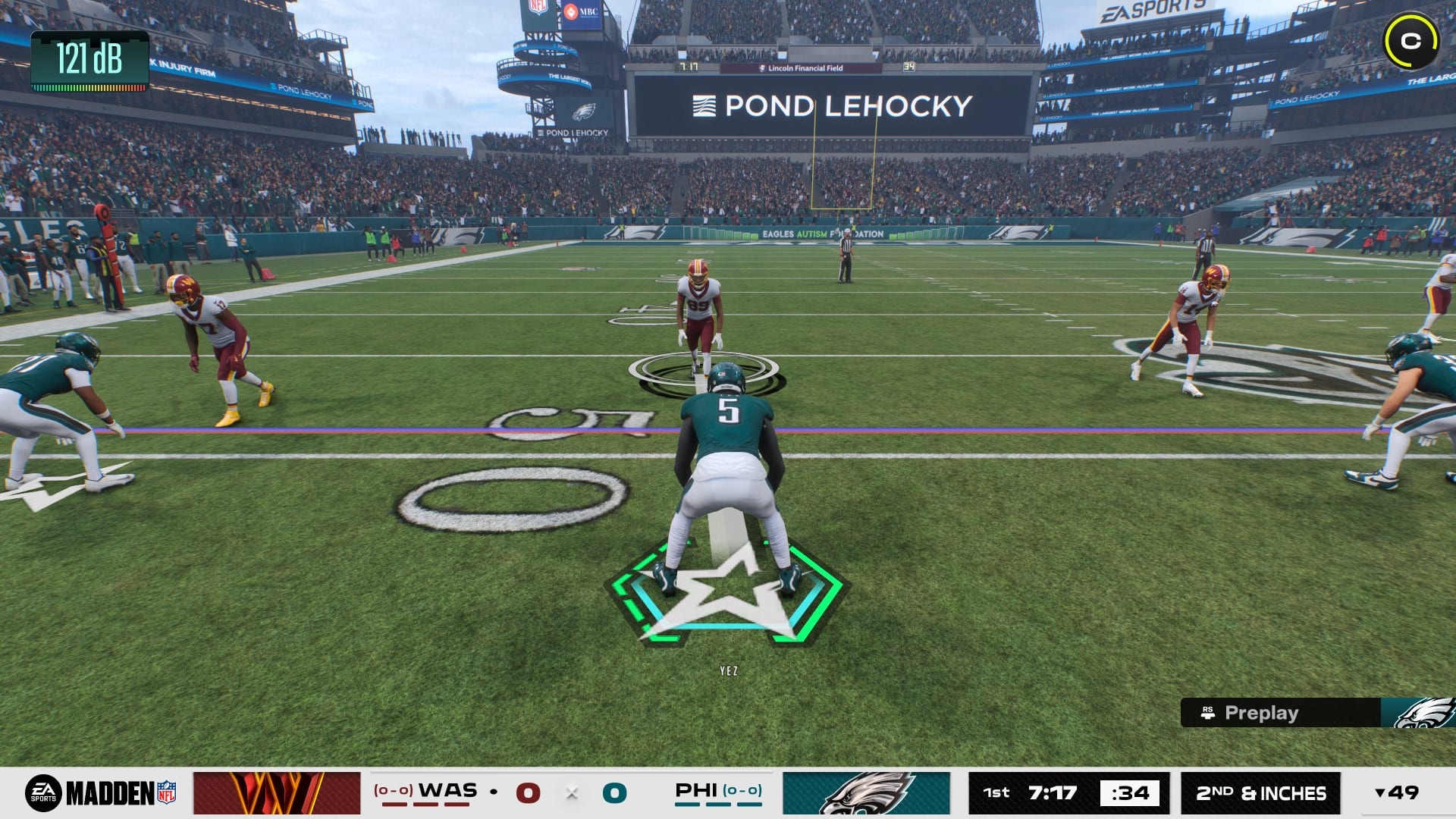 A Philadelphia Eagles player crouches at the line of scrimmage in Madden NFL, with the stadium scoreboard showing the Pond Lehocky logo.