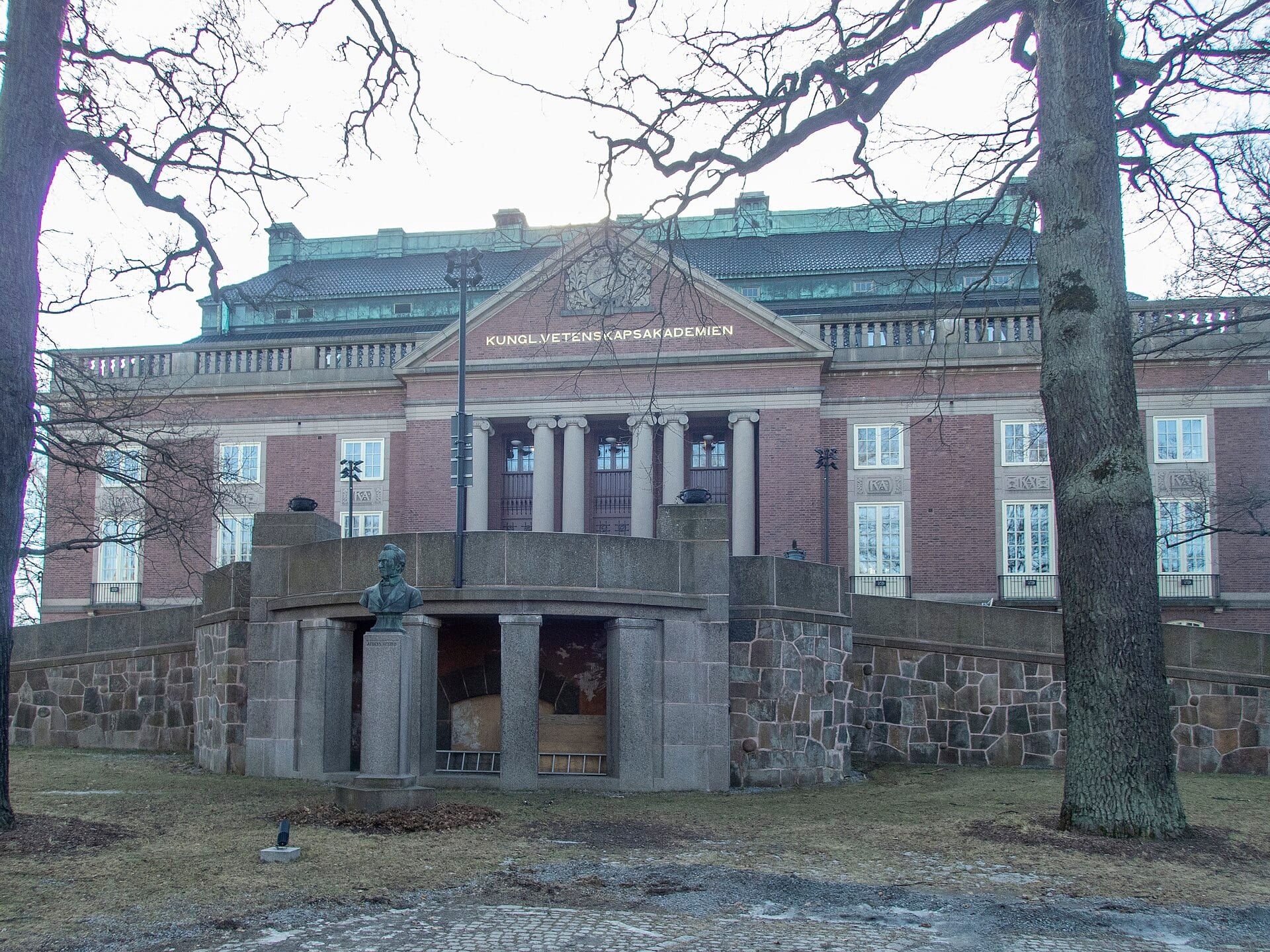 Red brick facade of the main building of the Royal Swedish Academy of Sciences, with the name Kungl. Vetenskapsakademien on the pediment.