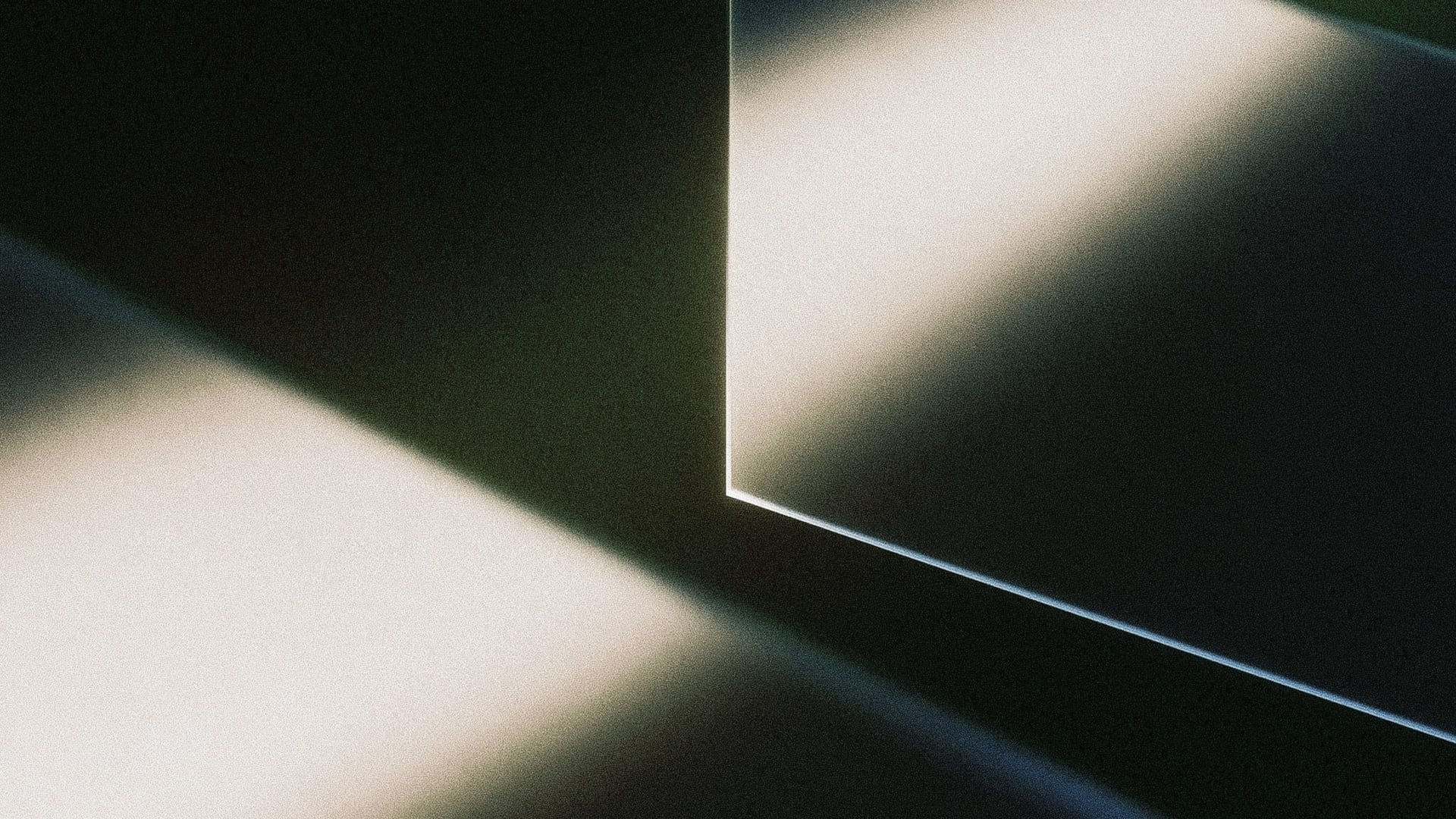 Abstract beams of white light cut across a dark plane, with a bright edge in the center.
