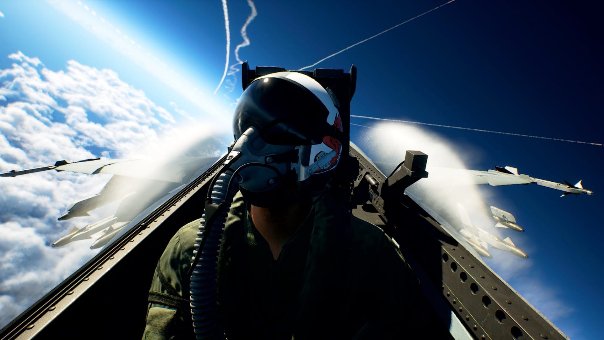 Un piloto con casco y máscara de oxígeno dentro de una cabina de caza, rodeado de nubes y misiles bajo las alas.