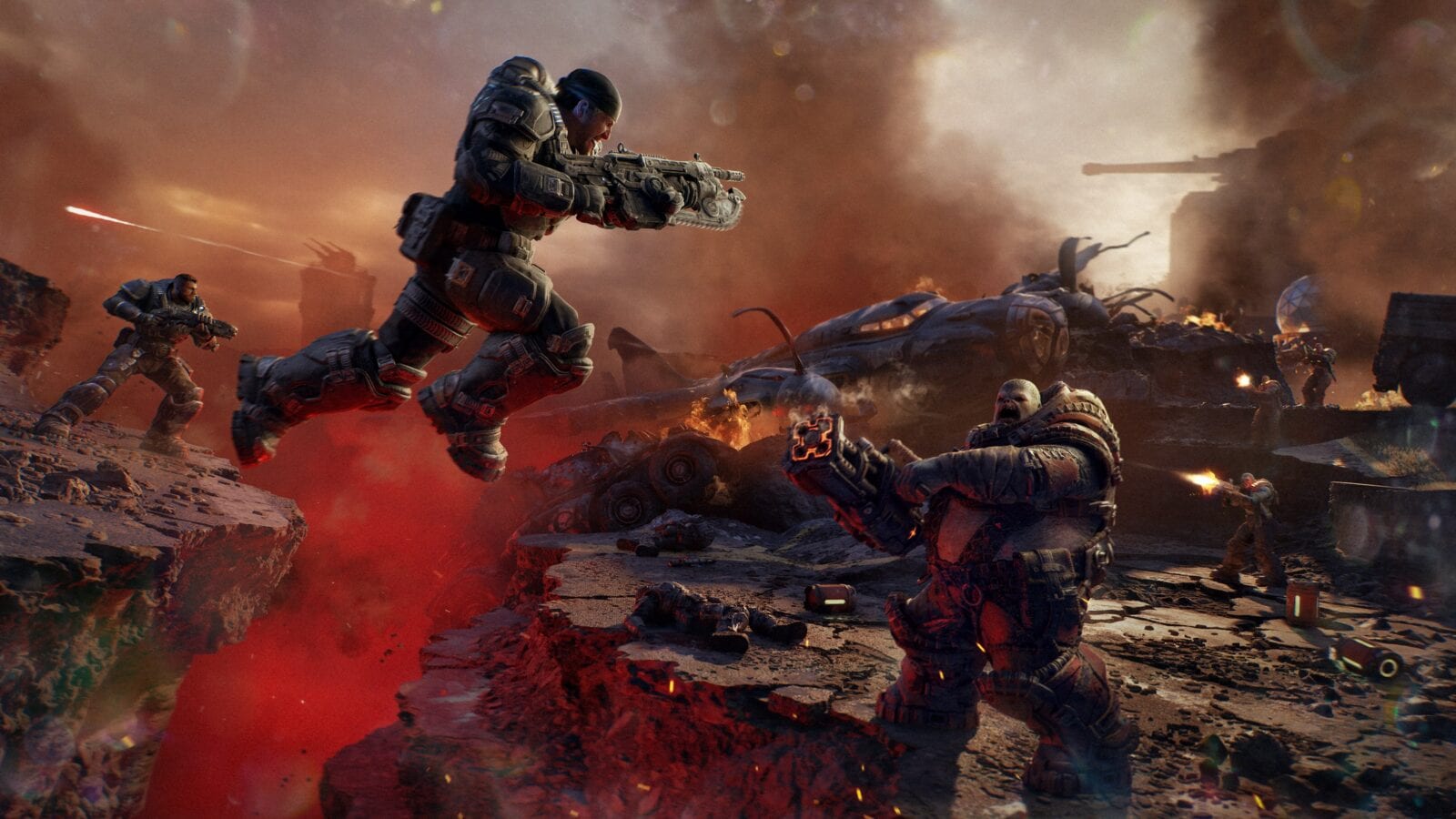Marcus Fenix leaps over a red crack in the ground with a Lancer rifle while a hulking enemy soldier aims at him among burning vehicles.
